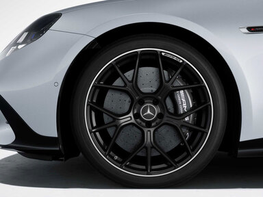 21" AMG Schmiederäder im Kreuzspeichen-Design mattschwarz lackiert mit Felgenhorn glanzgedreht, 53,3 cm